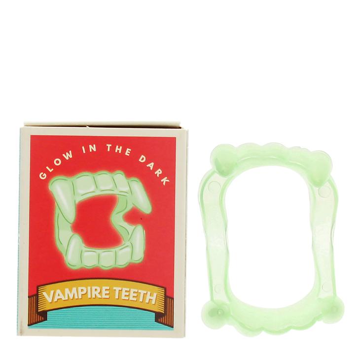 Glow in the dark vampire teeth