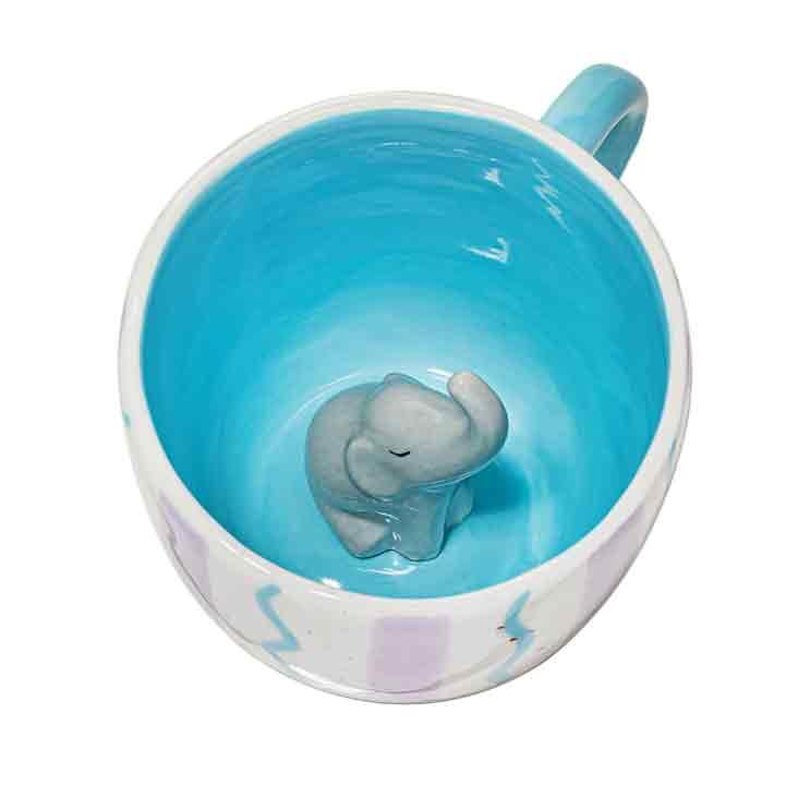 Tasse mit verstecktem Elefantenmotiv